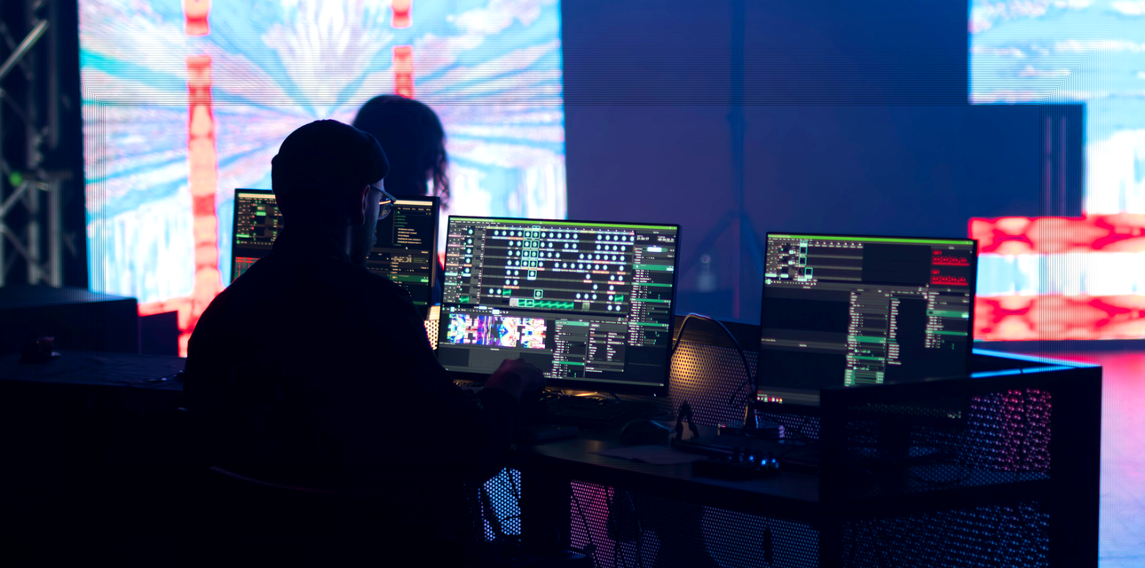 Engineer adjusting LED video wall from the viewing side