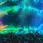 Festival stage with confetti and crowd silhouettes for LED rental spare planning