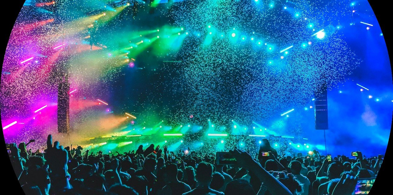 Festival stage with confetti and crowd silhouettes for LED rental spare planning