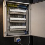 Electrical distribution panel for an LED wall hang, circuits sized for peak watts not average content.