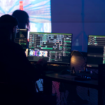 Technician adjusting LED video wall with dual power and signal paths in mind