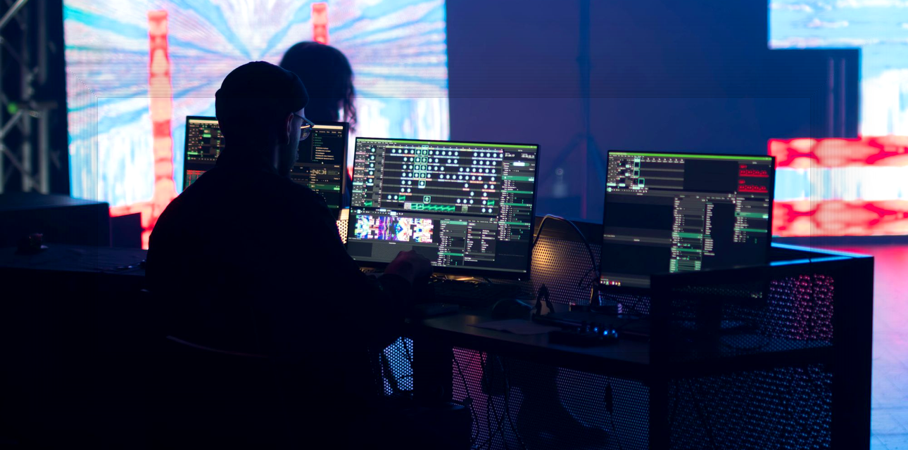 Technician adjusting LED video wall with dual power and signal paths in mind